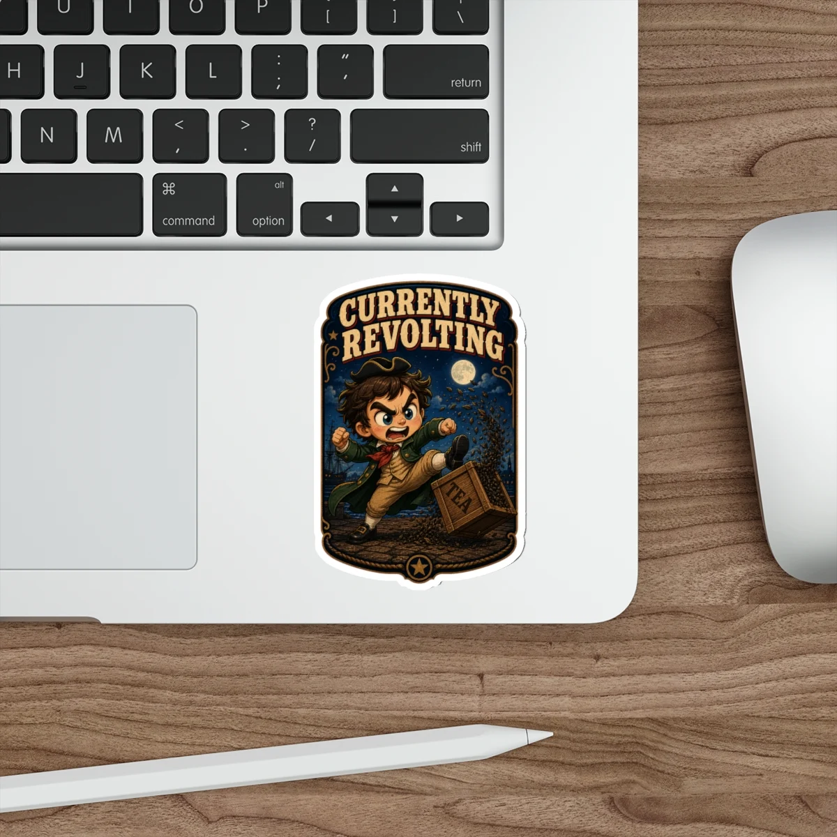 Currently Revolting sticker displayed on a silver laptop