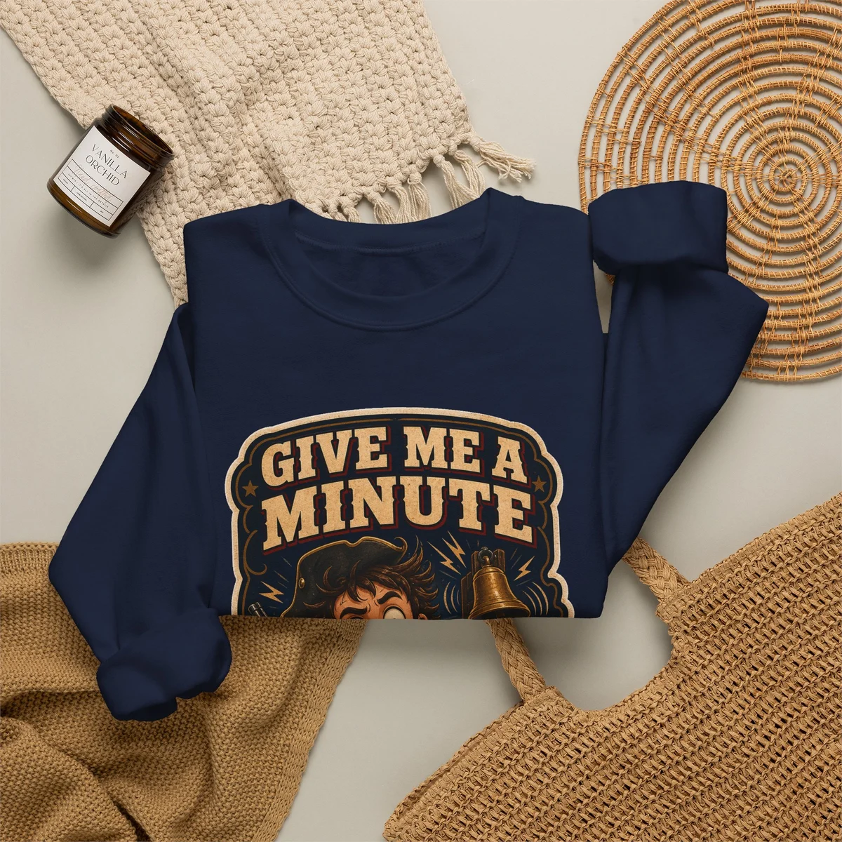 Close view of the Give Me a Minute artwork on Navy crewneck fabric